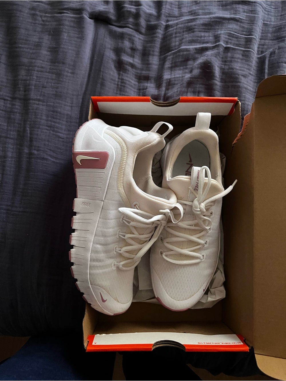 Nike White Athletic Trainers with Pink Accents